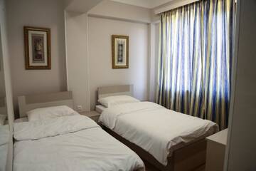 Фото номера Стандартный двухместный номер с 2 отдельными кроватями Отель Central Hotel г. Цхалтубо 16